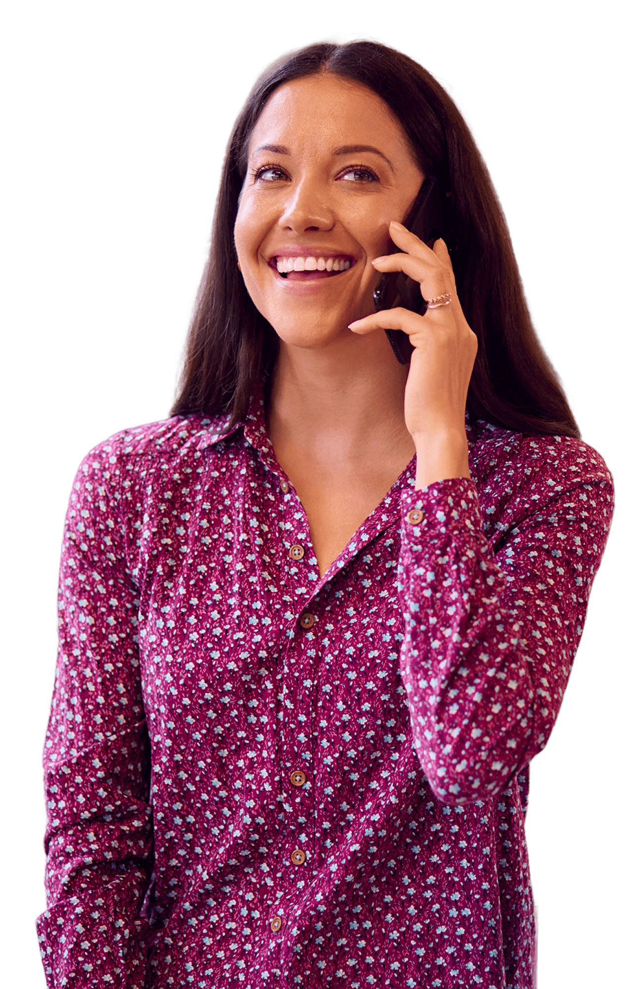 Business professional smiling on a phone call