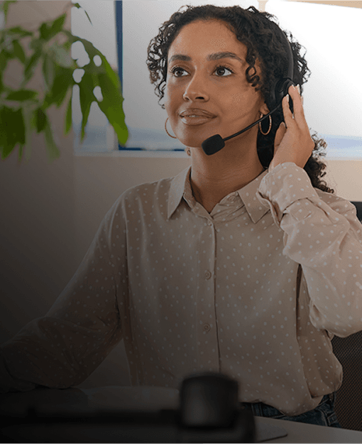 Woman with headset smiling - Leased Lines